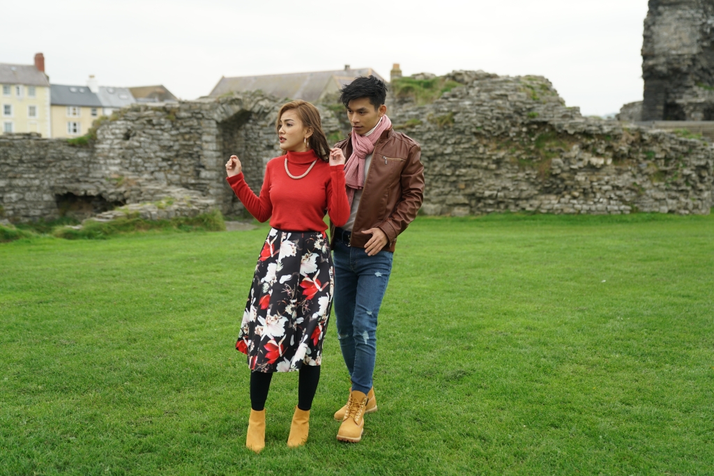 Eyka Farhana and Jaa Suzuran in castle ruins in Autumn in Wales movie
